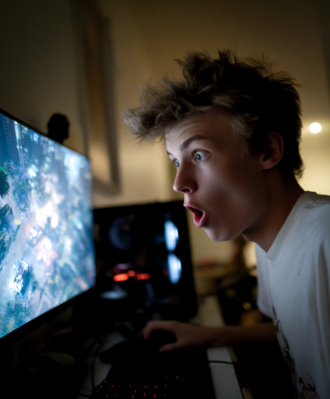 Excited Gamer Reacting to Intense Gameplay